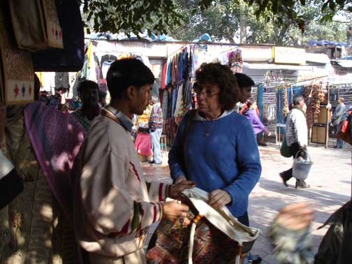 Shelley negotiating for her handbag in Delhi.