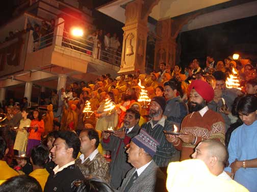 Everyone then stood with the oil lamps.
