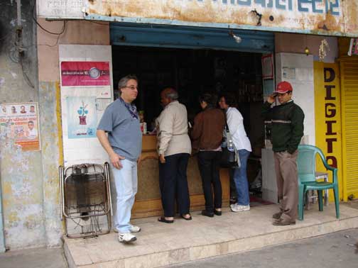 Hugh, Sushi, Nita, Shelley buying at a small town drugstore at Haridwar.